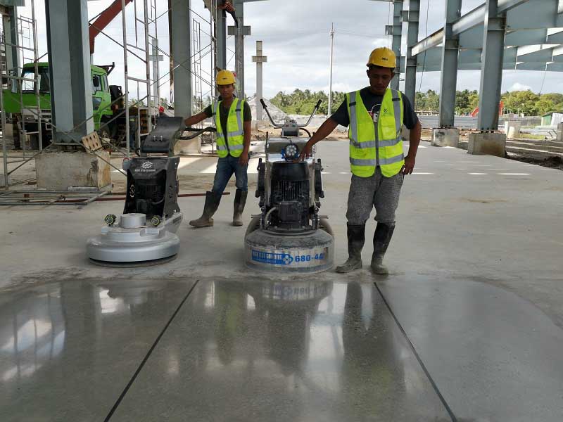 Planetary concrete floor grinding machine
